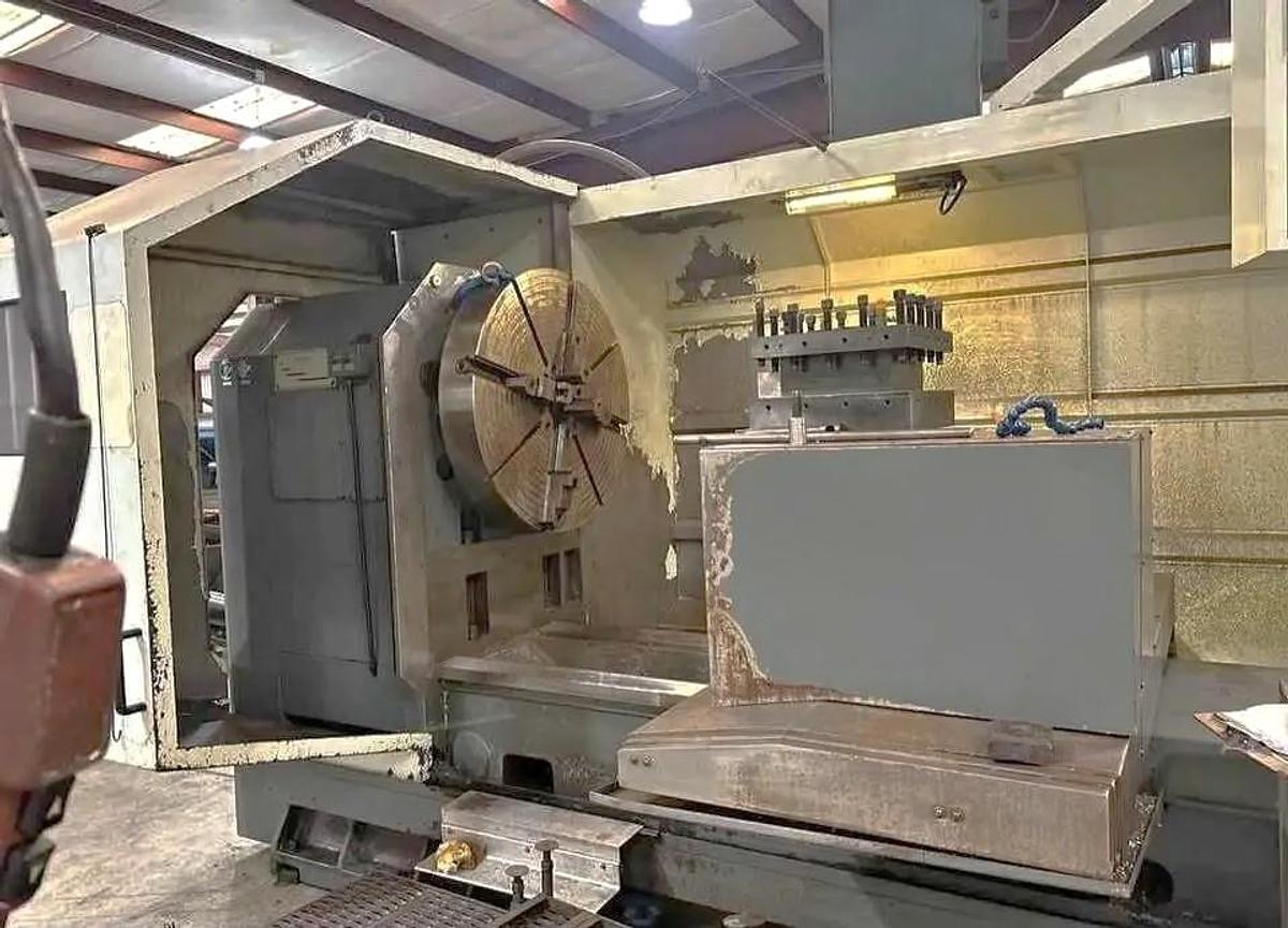 Used 2013 Takang LB40 x 1200 CNC Heavy Duty Lathe with 60" sw, 39.3" Max Cut Diam., 600 RPM, 6" Bore, 36" Chuck, 4 Pos. Trt., Fanuc