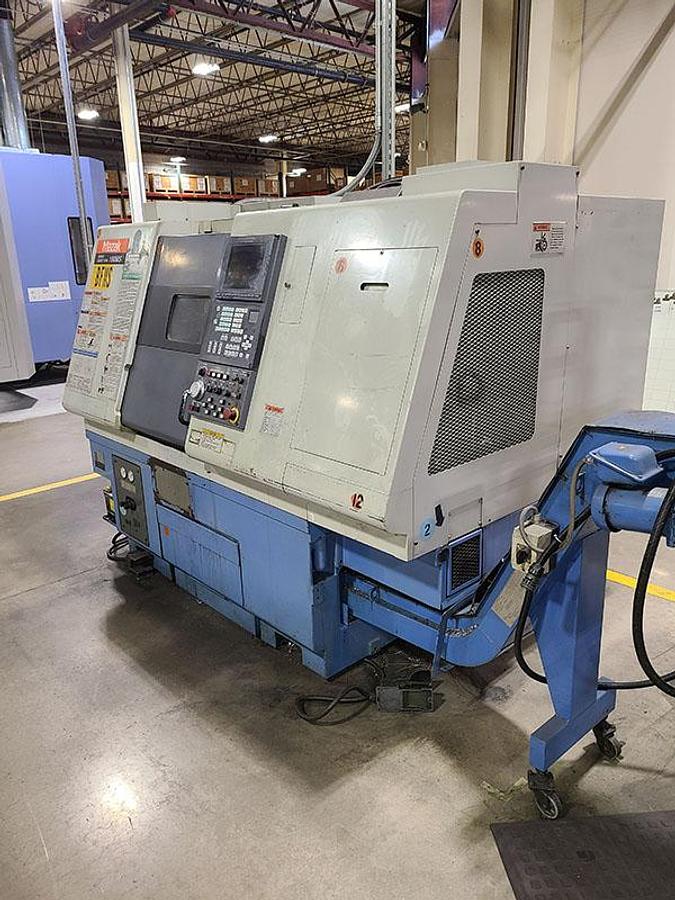 Used 2001 Mazak SQT100MS Mazatrol Fusion 640T with Milling/Drilling Capability, Subspindle, Full C Axis Spindle Rotation, Conveyor