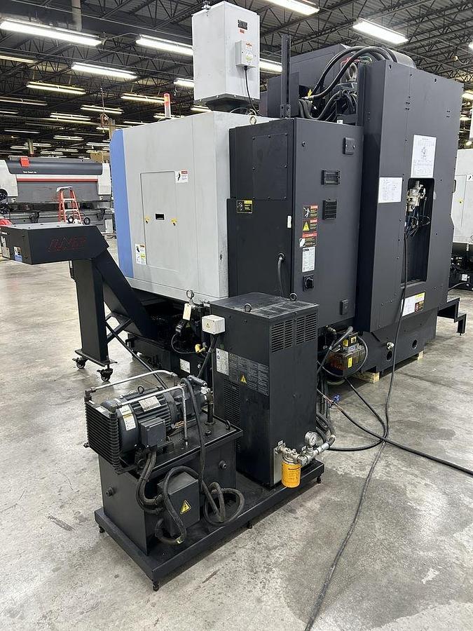 Used 2022 DN Solutions Mynx 5400/50 II with 4th Axis Drive, CAT50 Big Plus Spindle, Chip Conveyor, Mist Collector, Conversational