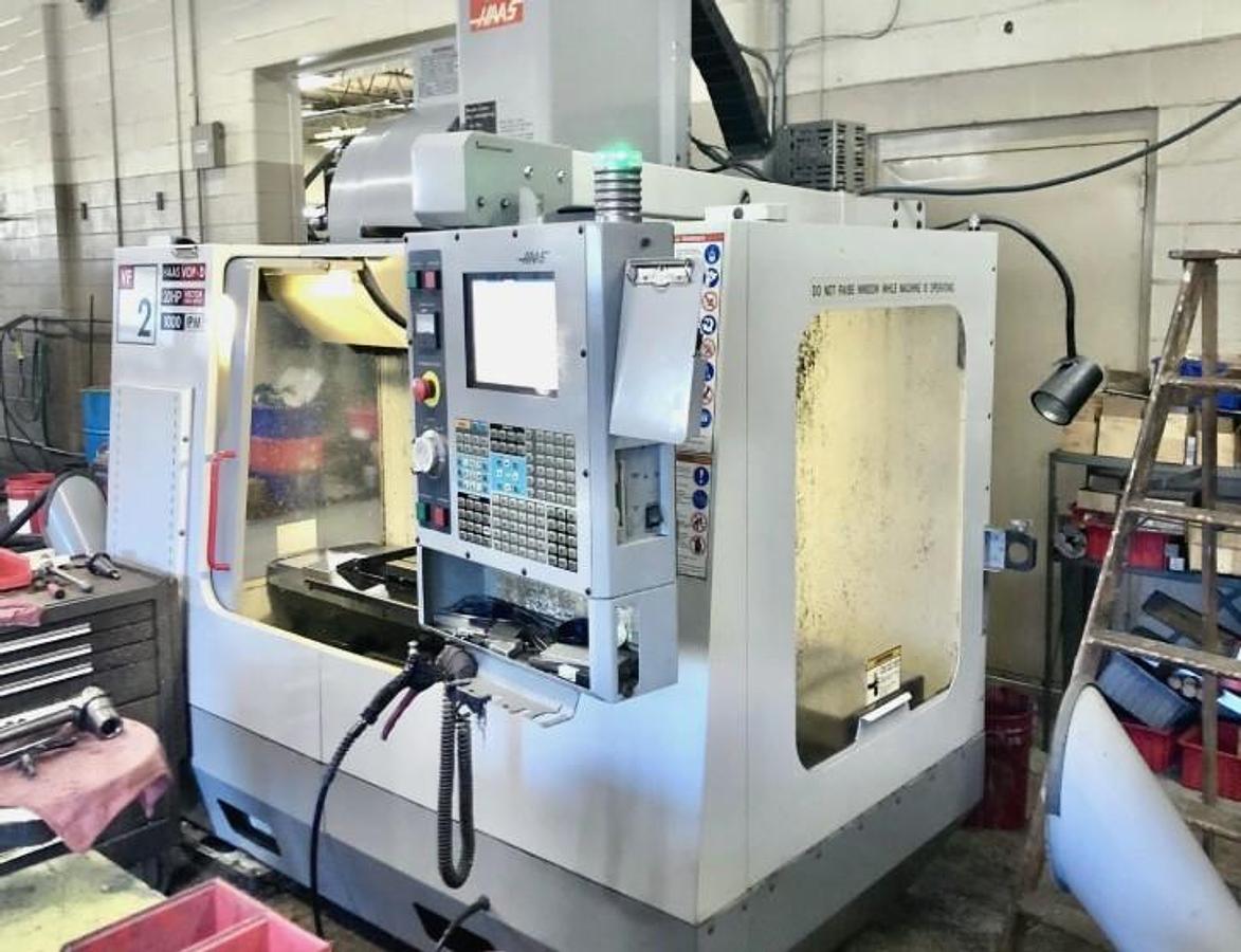 Used 2005 Haas VF2D with 4th Axis Drive, 24 Station Side Mount ATC, Chip uger, Programmable Coolant