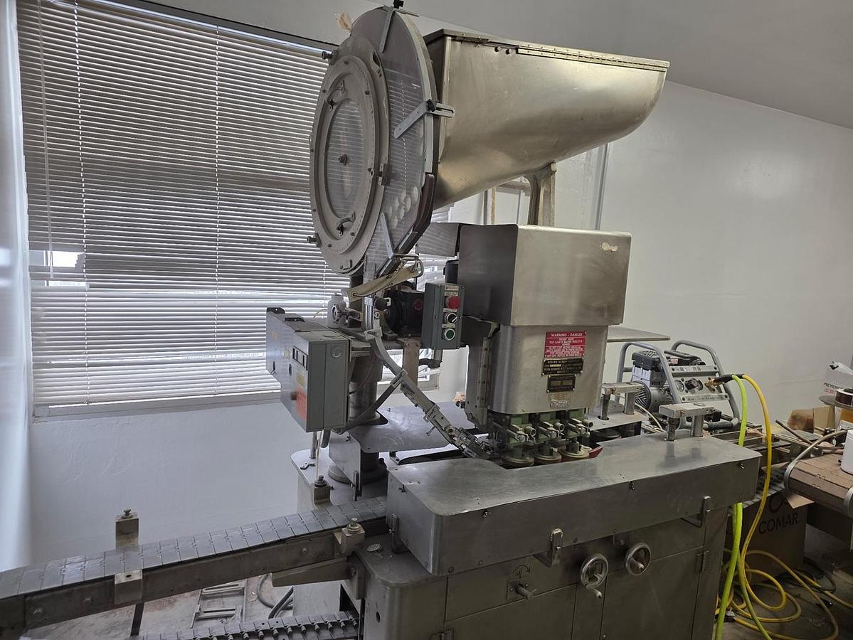 Used Resina U-30 Stainless steel base capper