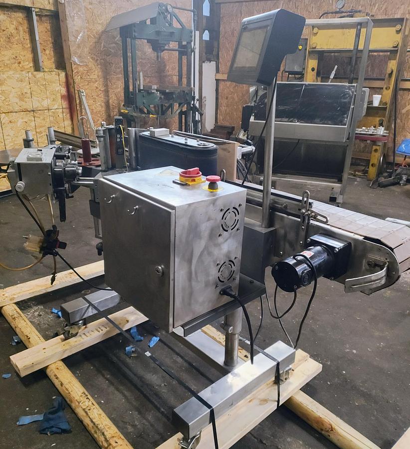 Used CVC pressure sensitive wrap labeler