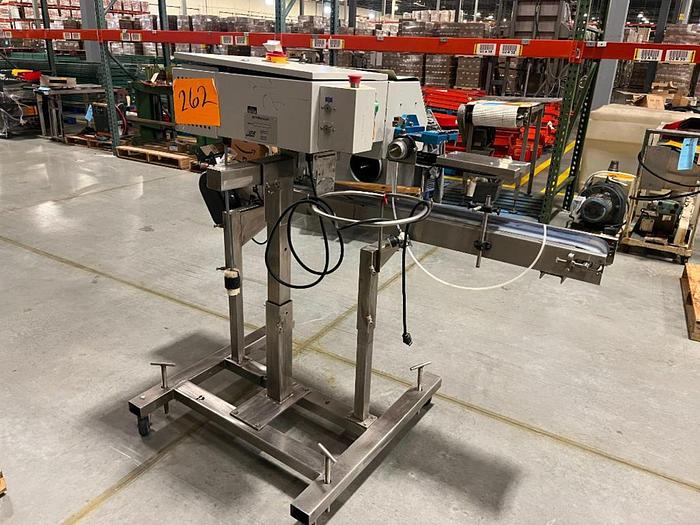 Used OK band sealer with conveyor on stainless stand