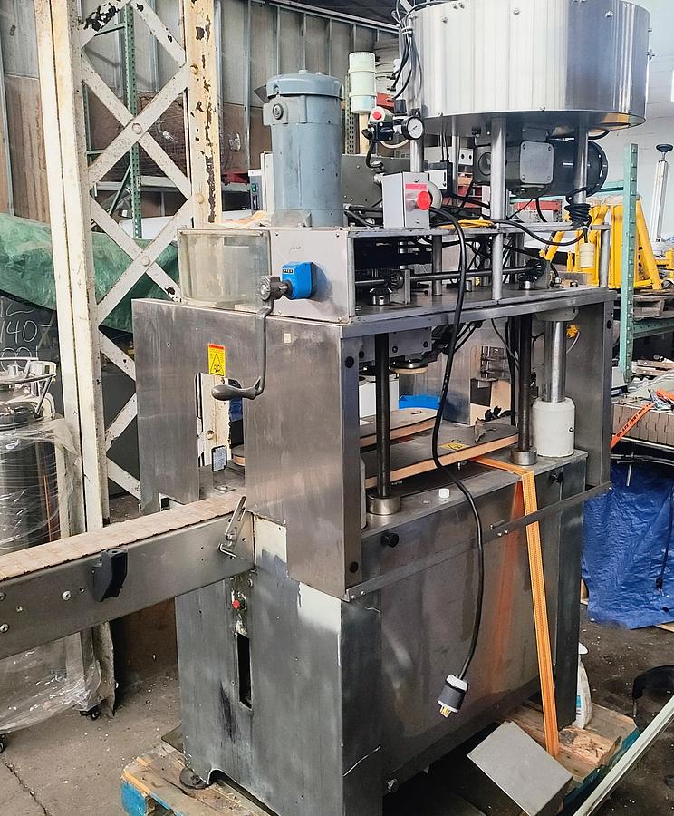Used Kaps All MDL A capper with rotary feeder