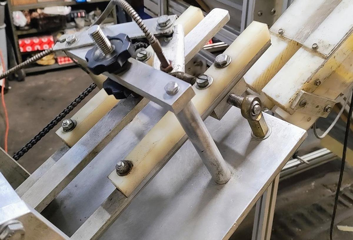 Used Equipment Express 6 quill capper with waterfall feeder