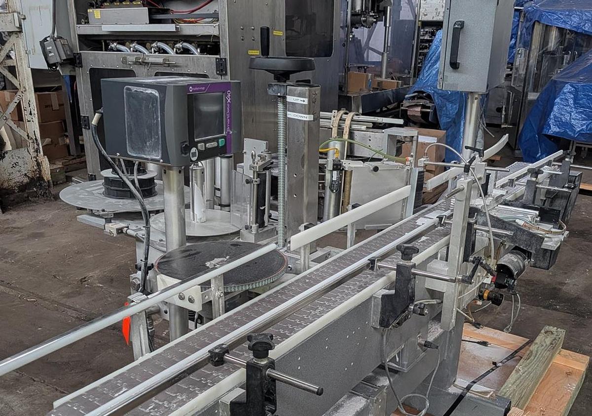 Used Universal 320 wrap labeler for larger containers 320