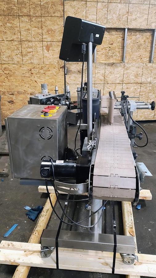 Used CVC pressure sensitive wrap labeler