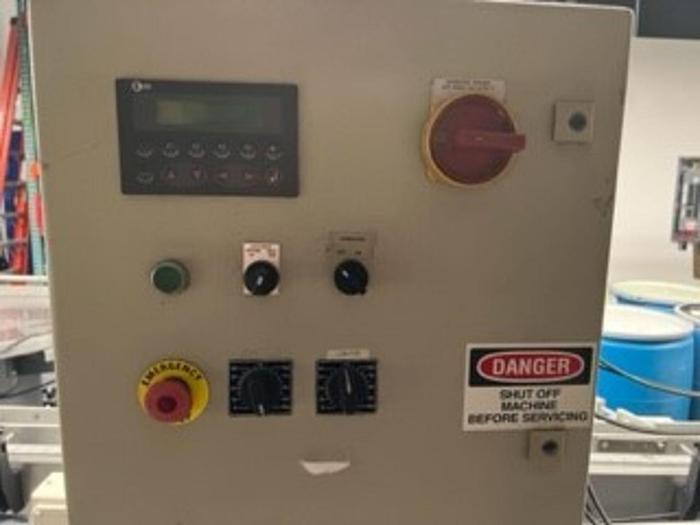 Used JDA 6 head Gravity Filler with indexing conveyor SS m220.6