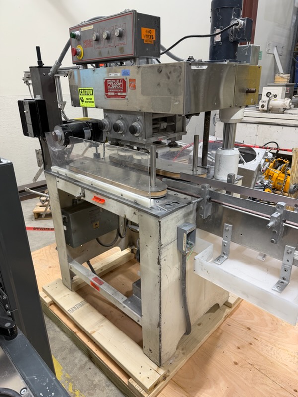 Used Kaps All model A capper with Waterfall Feeder for large caps A