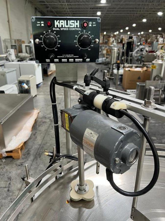 Used Kalish 36" diameter unscrambler with container agitation