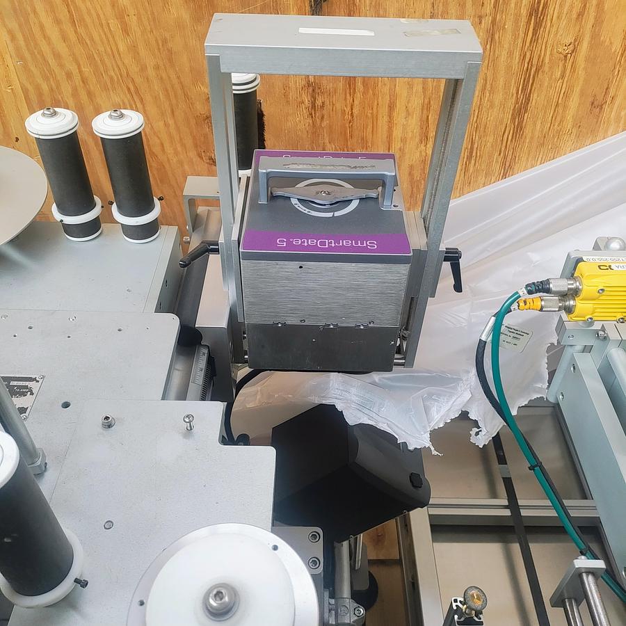 Used LSI Front and Back Labeler with integrated hold down