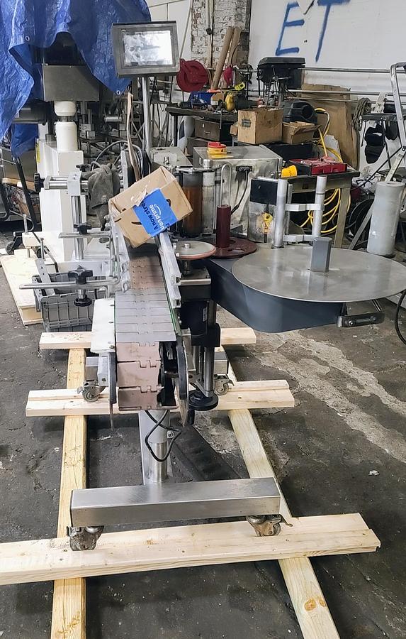 Used CVC  300 pressure sensitive wrap labeler