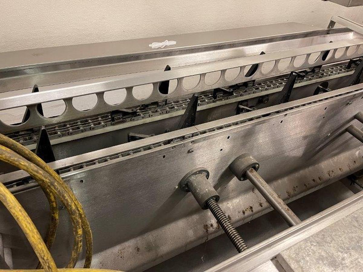 Used ADCO 15D-105 Stainless Hand Load cartoner , 12" centers