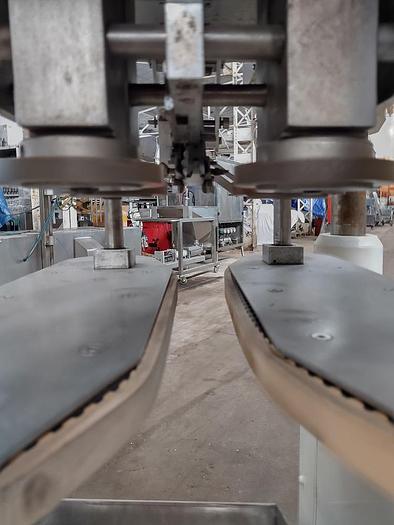 Used Kaps All E automatic  C frame capper with vibratory feeder