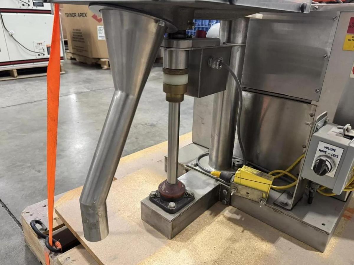 Used Speedee BR-234 Volumetric Filler with Foot pedal and eye operation.