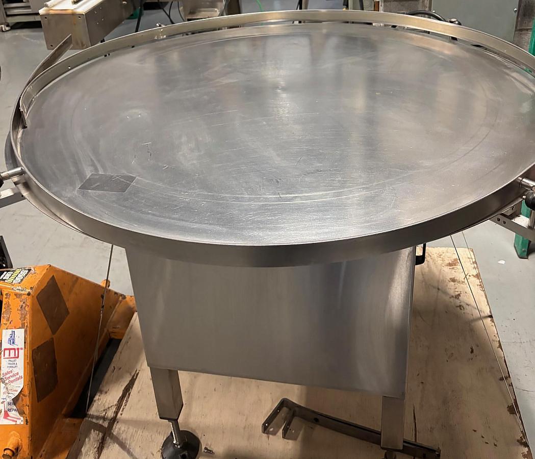 Used Capmatic 48" dia Accumulation table