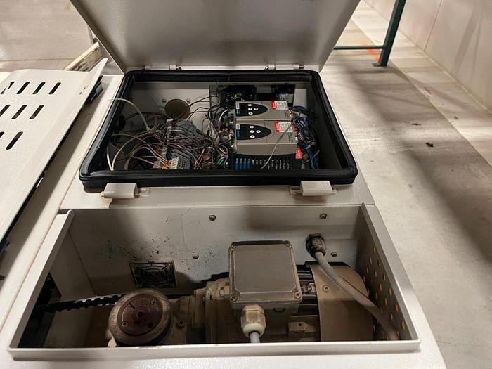 Used OK band sealer with conveyor on stainless stand