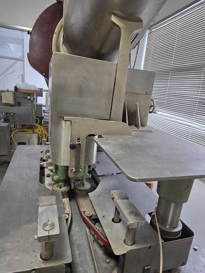 Used Resina U-30 Stainless steel base capper