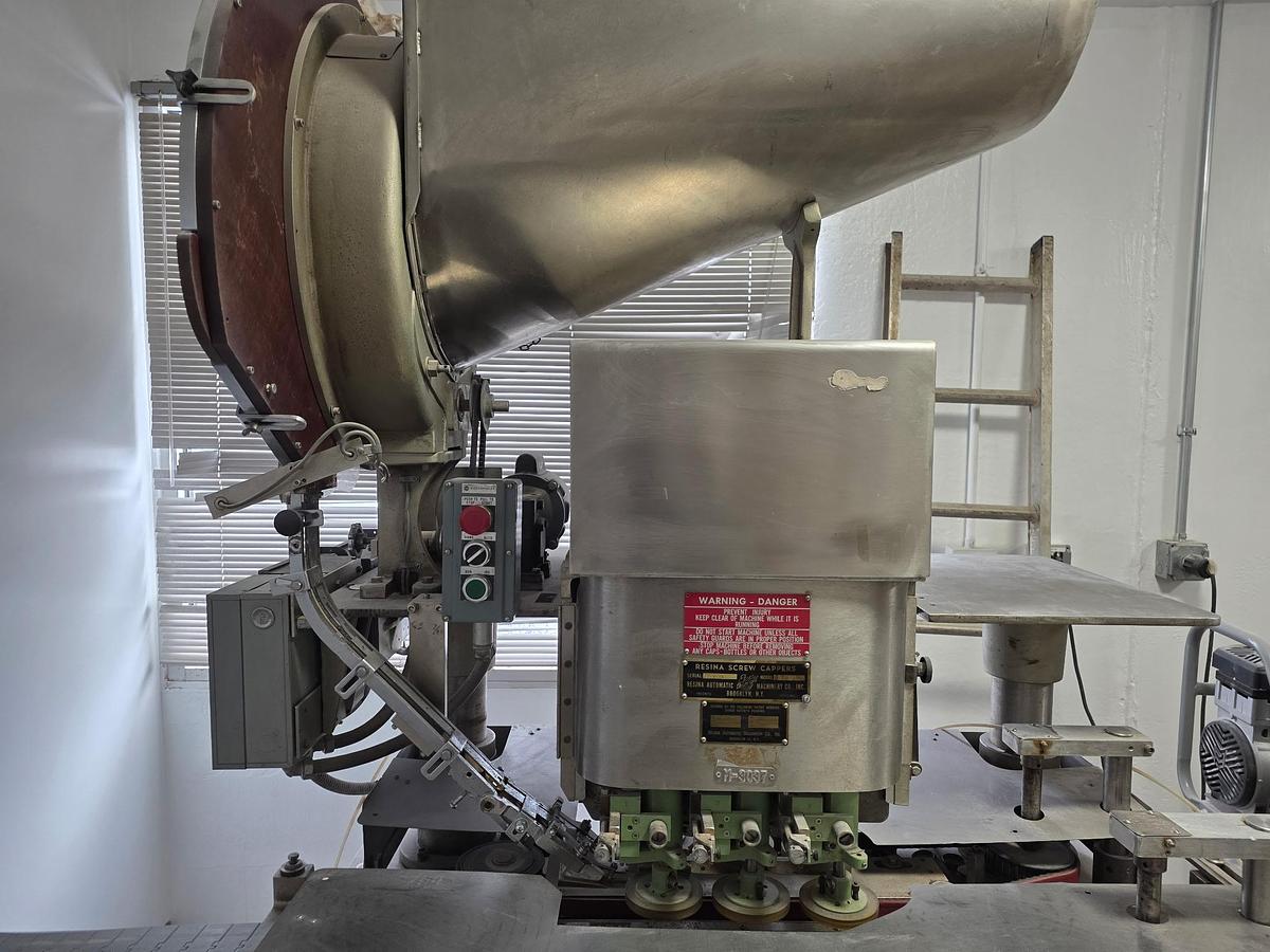 Used Resina U-30 Stainless steel base capper