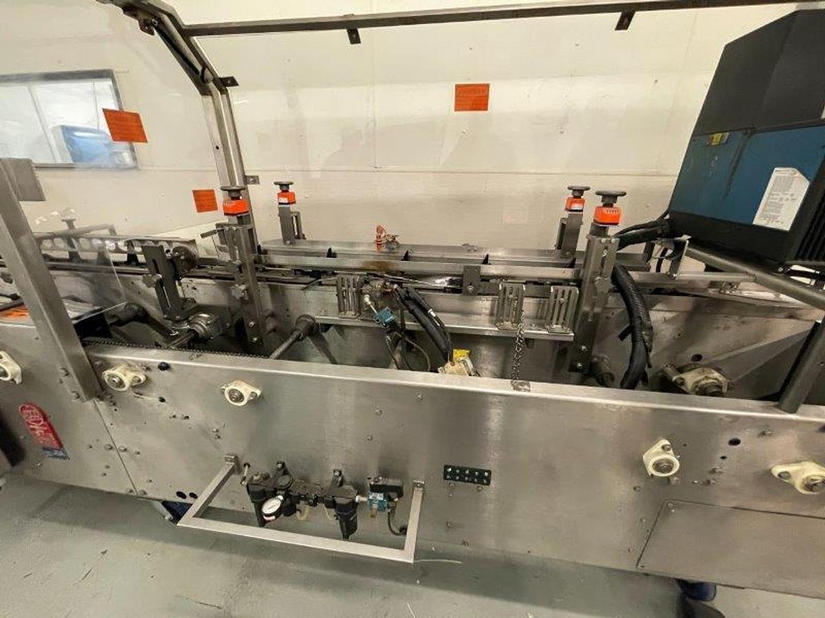 Used ADCO 15D-105 Stainless Hand Load cartoner , 12" centers