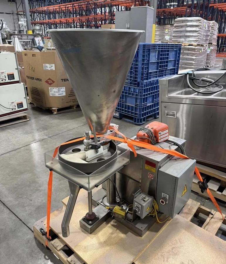 Used Speedee BR-234 Volumetric Filler with Foot pedal and eye operation.