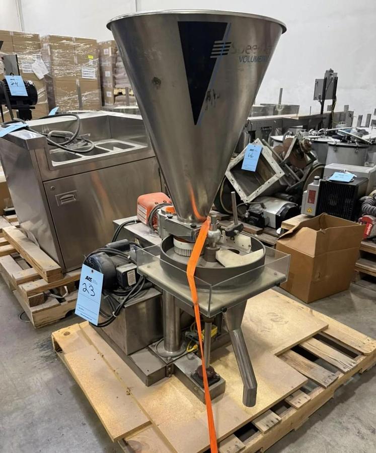 Used Speedee BR-234 Volumetric Filler with Foot pedal and eye operation.