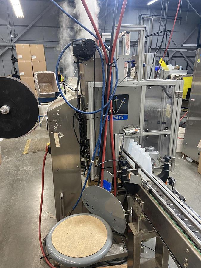 Used Aesus Eco Shrink Sleeve labeler with Steam Tunnel