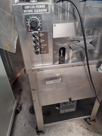 Used Autoprod 75mm cup filler with foil over seal