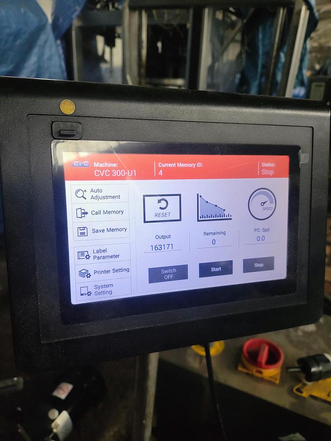 Used CVC pressure sensitive wrap labeler