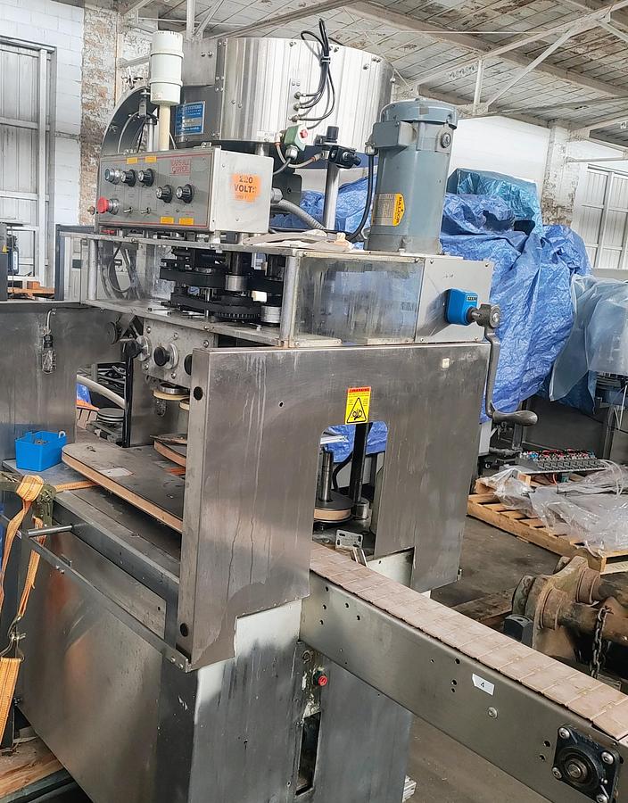 Used Kaps All MDL A capper with rotary feeder