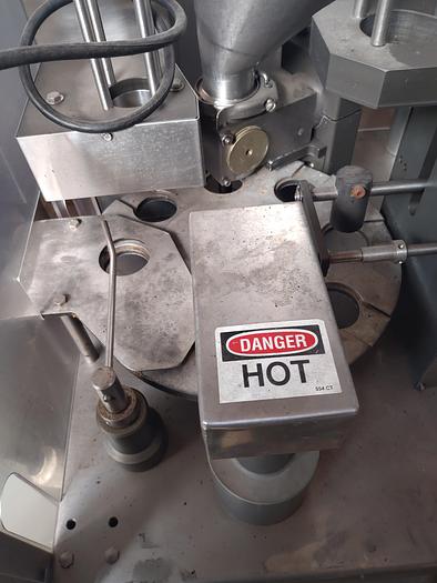 Used Autoprod 75mm cup filler with foil over seal