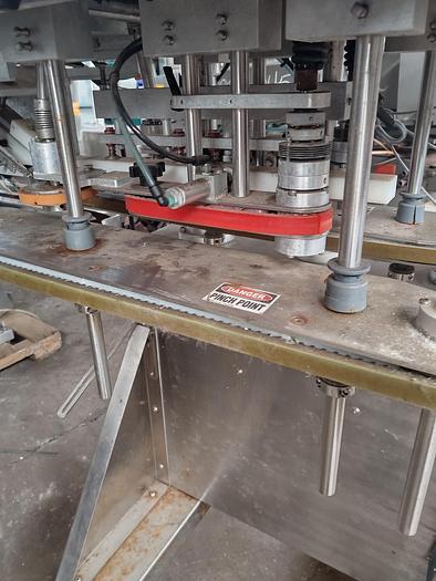 Used Inline Filling Systems capper with Waterfall feeder