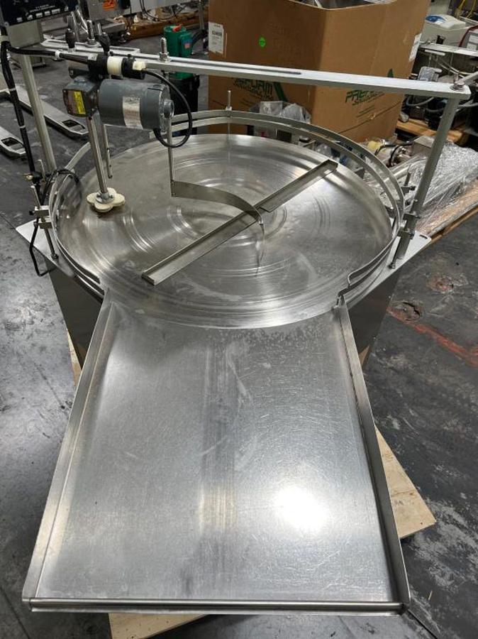 Used Kalish 36" diameter unscrambler with container agitation