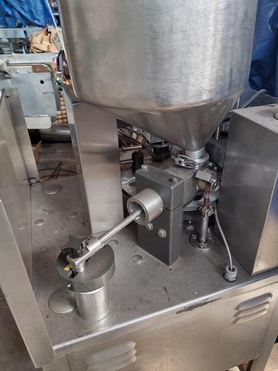 Used Autoprod 75mm cup filler with foil over seal