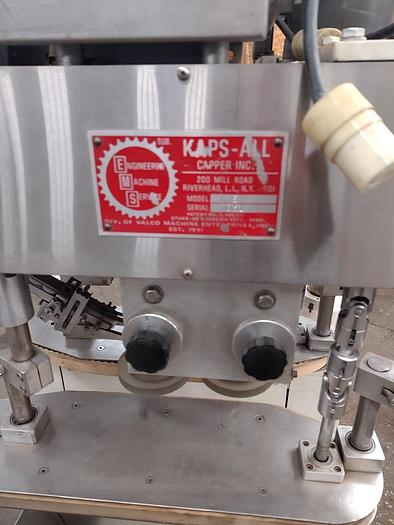 Used Kaps All E automatic  C frame capper with vibratory feeder