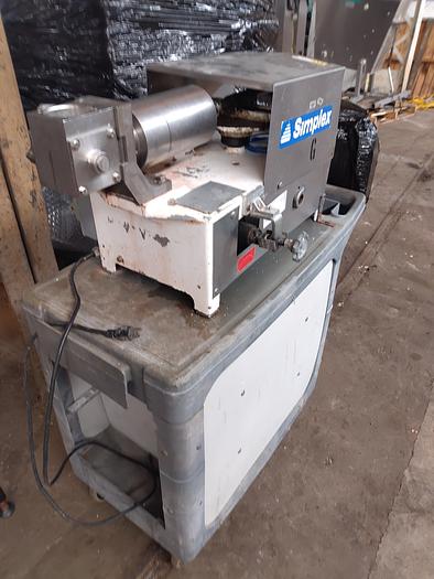 Used Simplex AS-1 Piston filler with quart piston