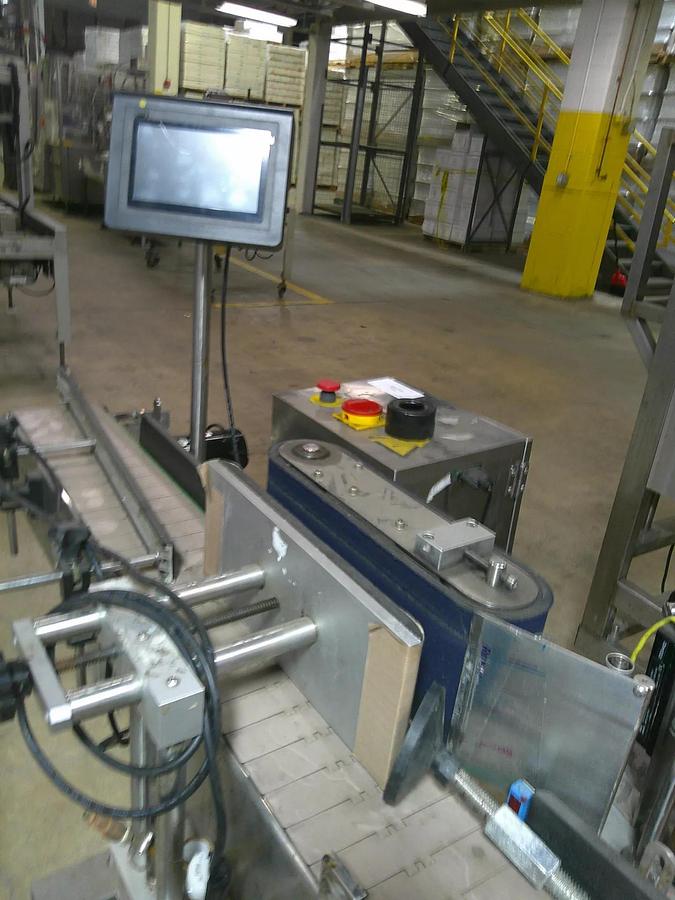 Used CVC pressure sensitive wrap labeler