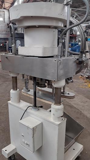 Used Kaps All E automatic  C frame capper with vibratory feeder