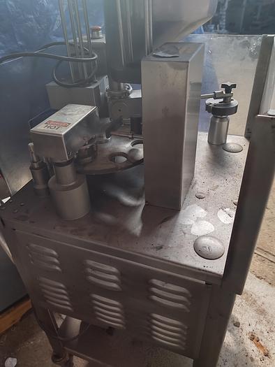 Used Autoprod 75mm cup filler with foil over seal