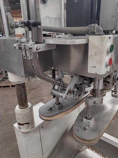 Used Kaps All E automatic  C frame capper with vibratory feeder