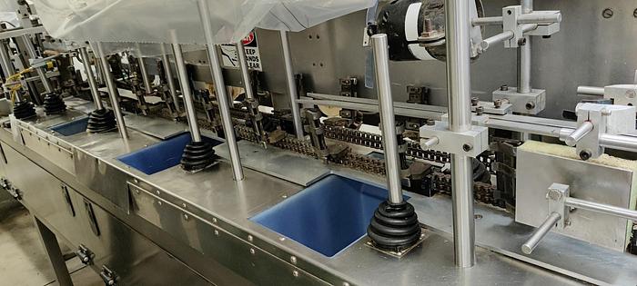 Used Bartelt IM7 Poucher -with 2 auger fillers