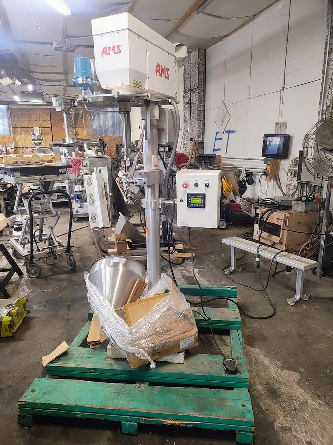 Used AMS  #A100-auger filler with foot pedal control