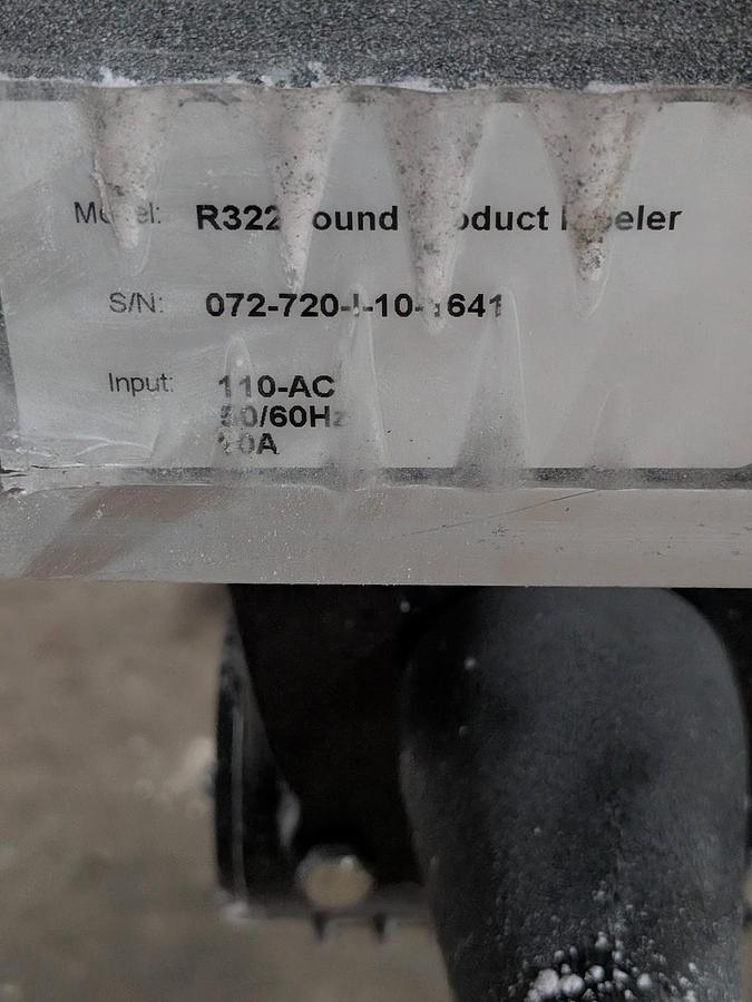 Used Universal 320 wrap labeler for larger containers 320