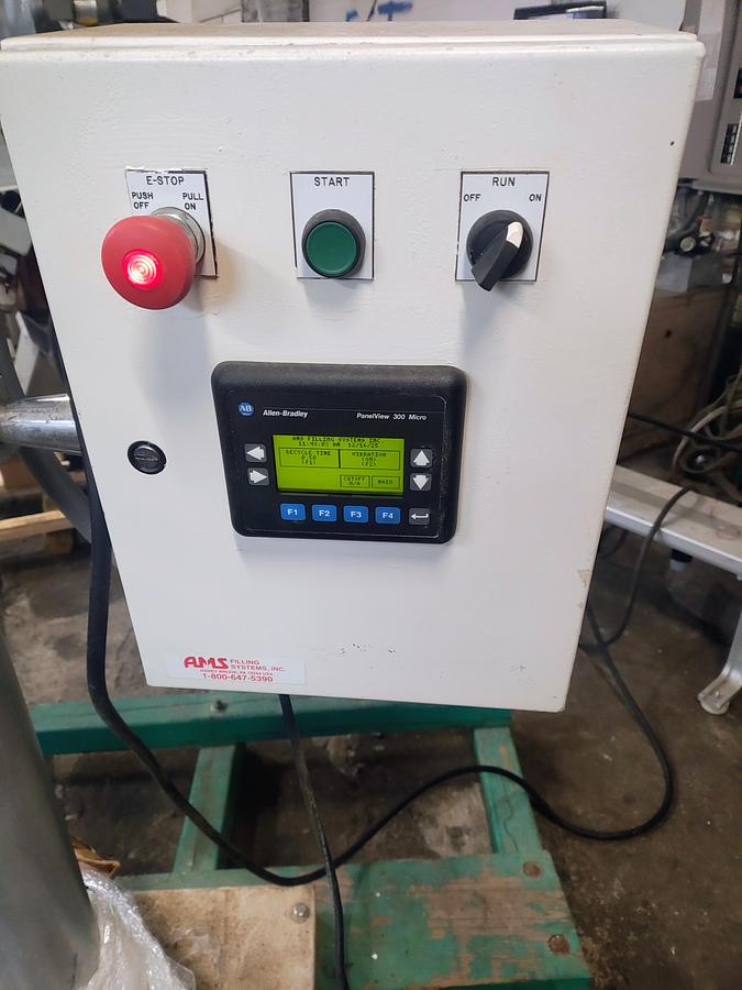 Used AMS  #A100-auger filler with foot pedal control