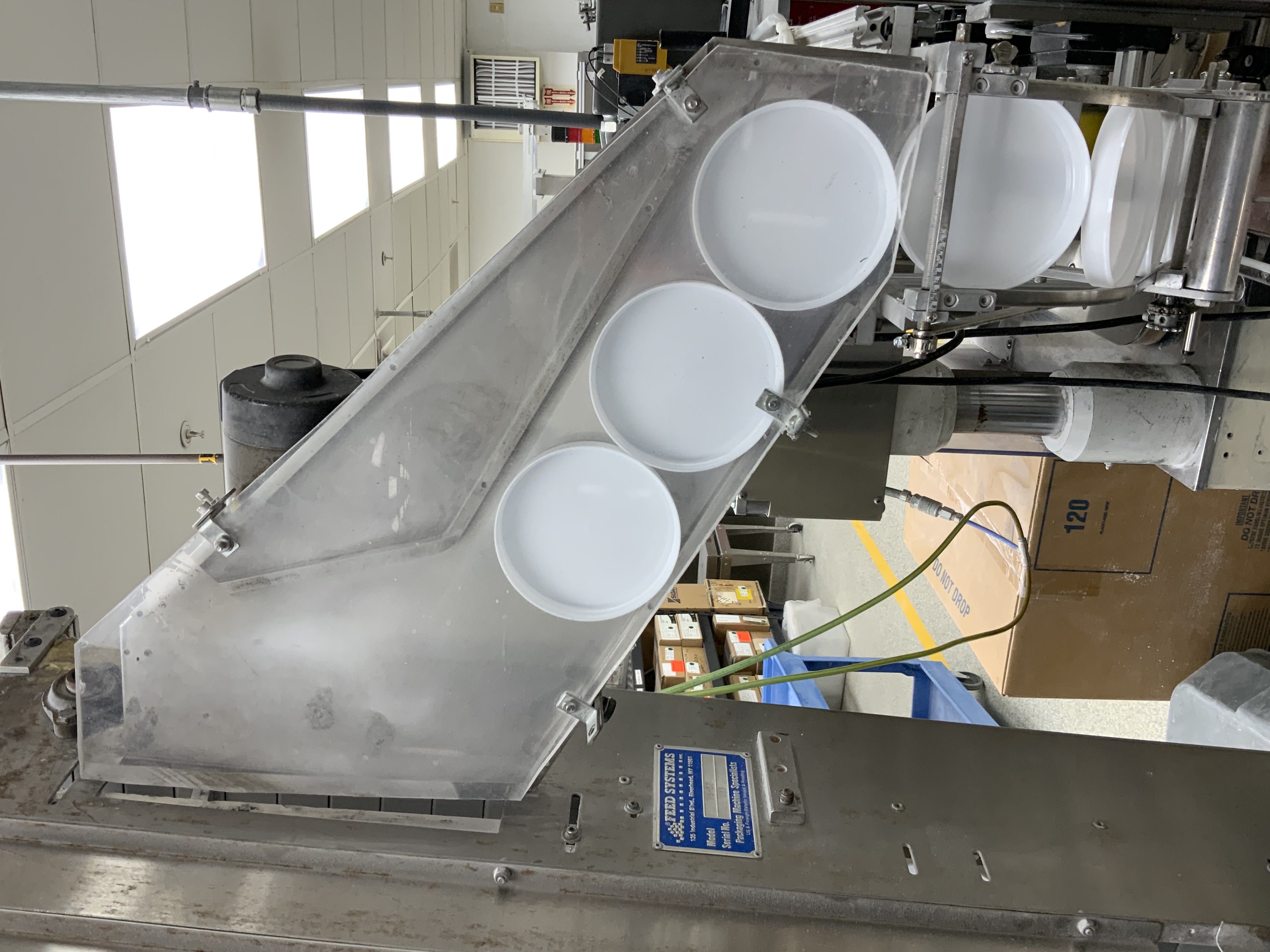 Used Kaps All model A capper with Waterfall Feeder for large caps A