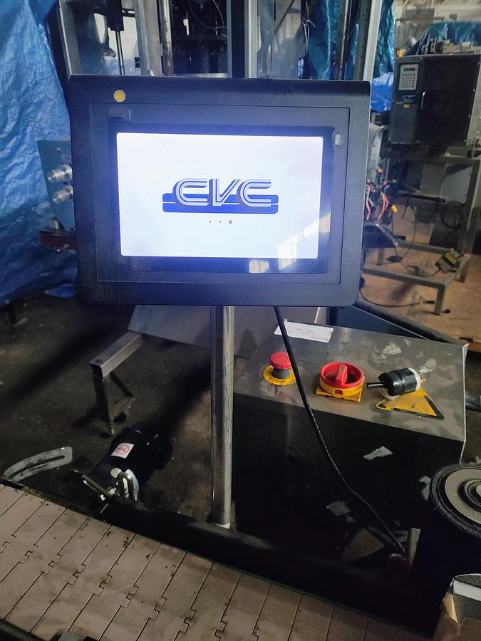 Used CVC  300 pressure sensitive wrap labeler