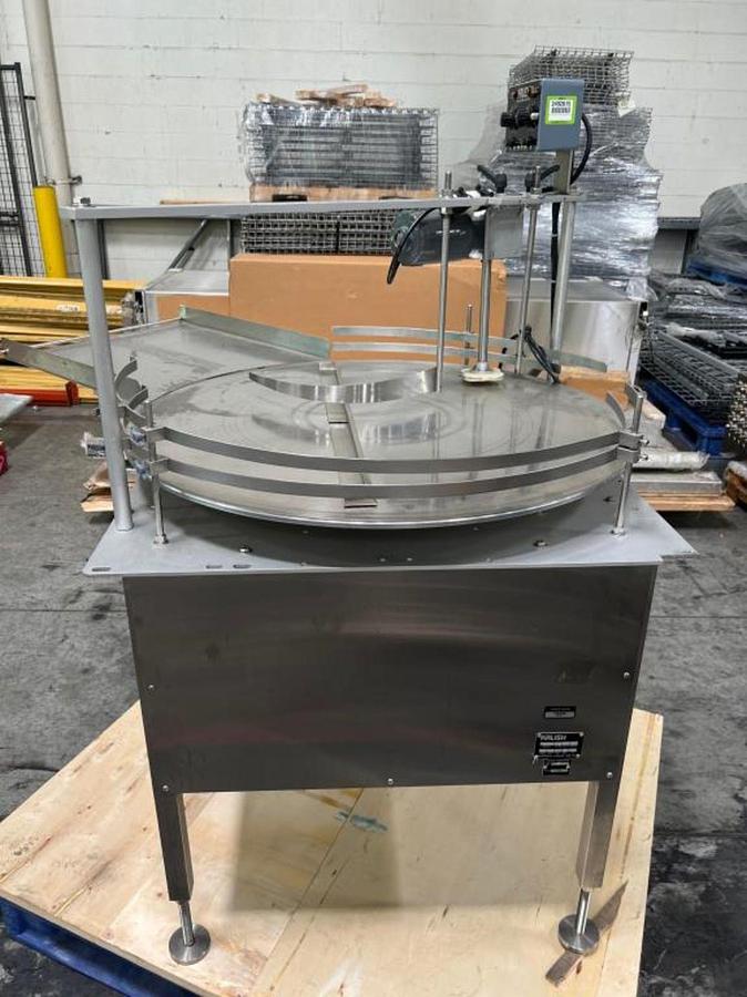 Used Kalish 36" diameter unscrambler with container agitation