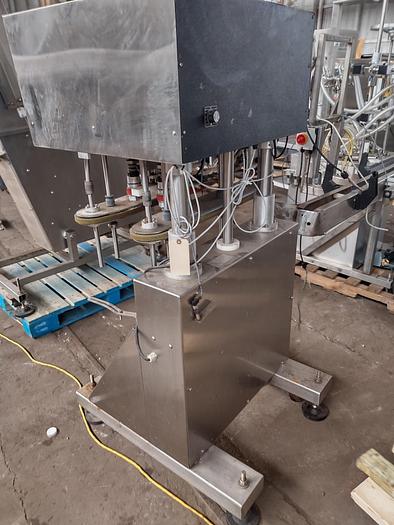 Used Inline Filling Systems capper with Waterfall feeder