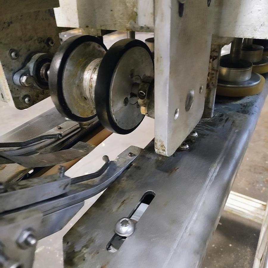 Used Equipment Express 6 quill capper with waterfall feeder