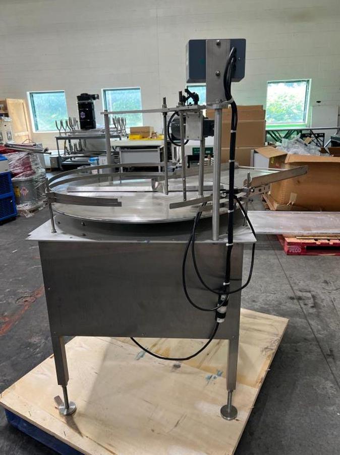 Used Kalish 36" diameter unscrambler with container agitation